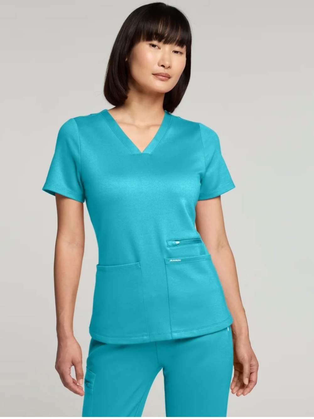 Jaanuu Women's Kass Slim 4-Pocket Scrub Top teal